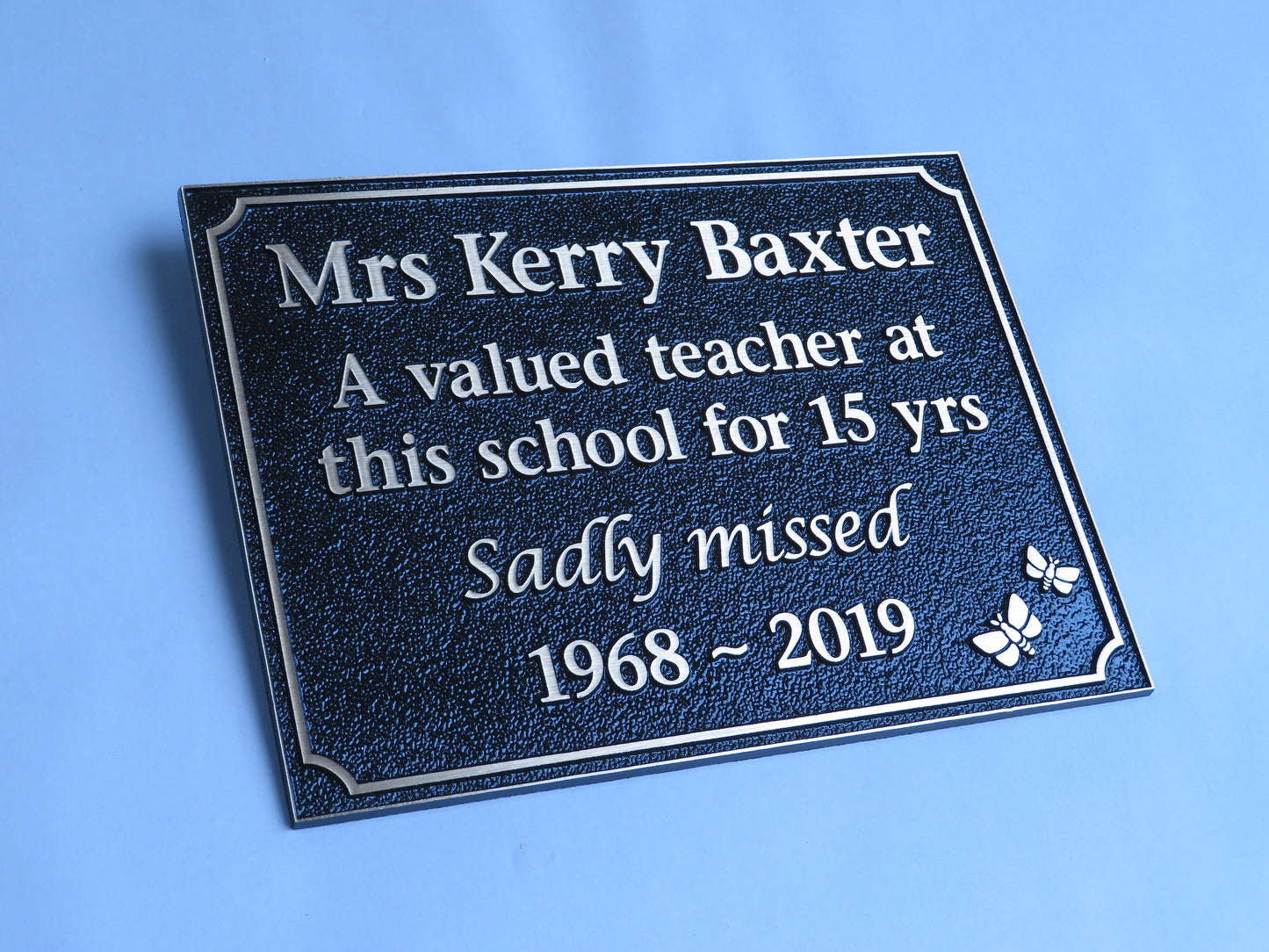 Bronze Plaque with a memorial inscription for a person