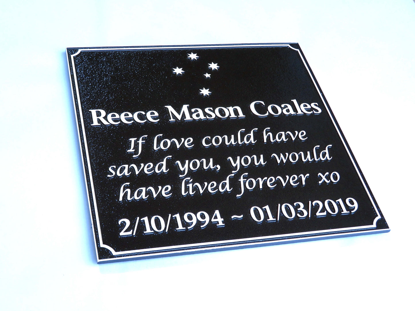 Large square bronze plaque with a memorial inscription for a person