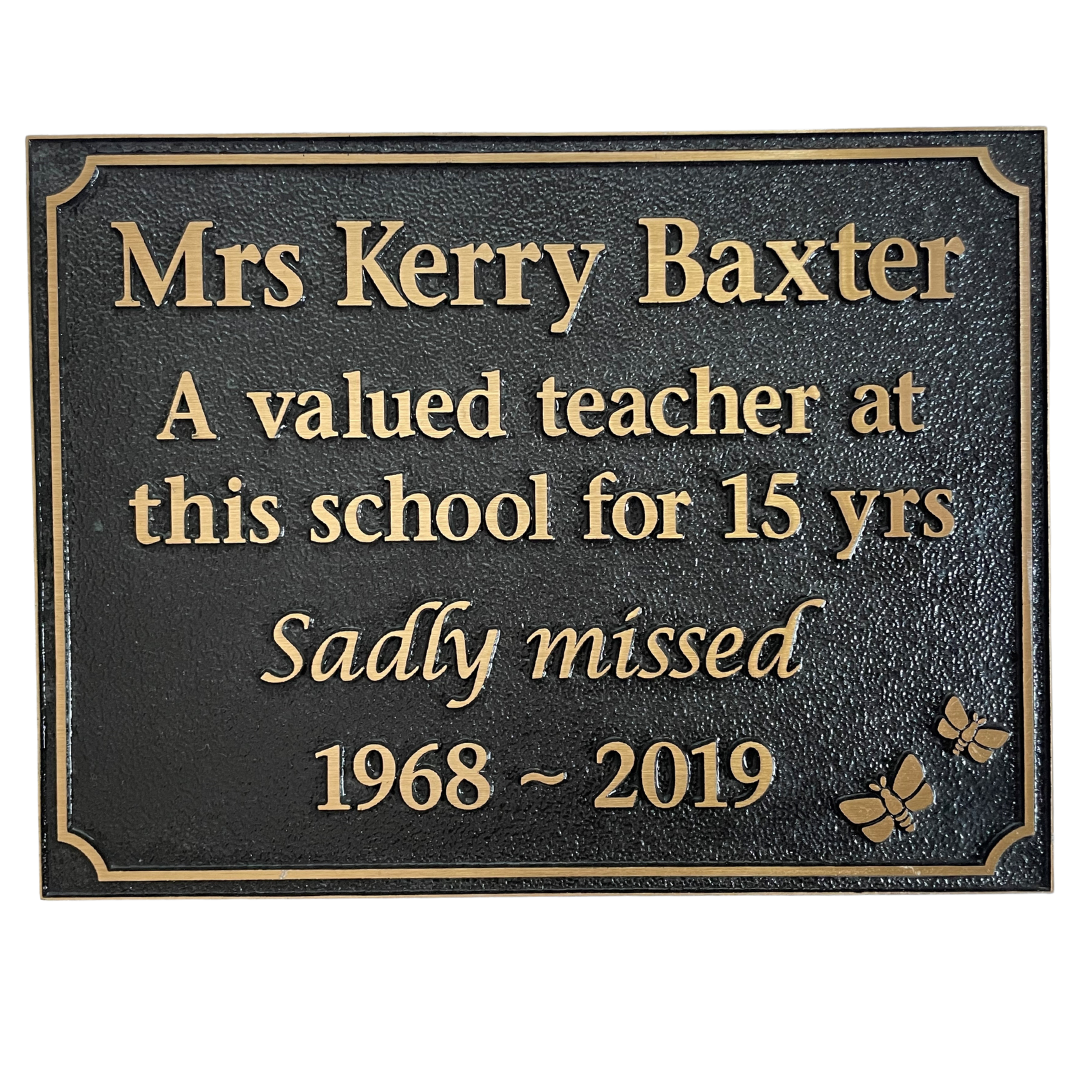 rectangle bronze plaque with memorial inscription for a person
