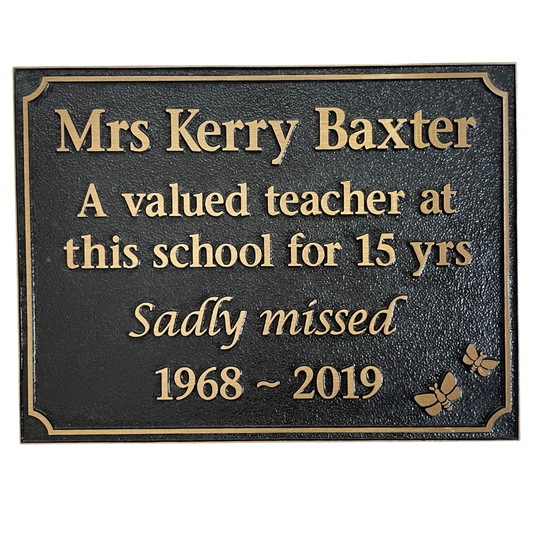 rectangle bronze plaque with memorial inscription for a person