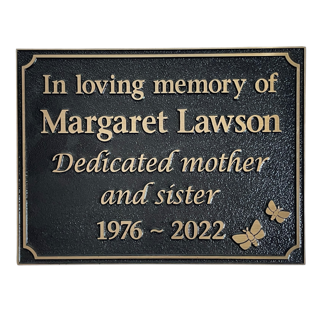 rectangle bronze plaque with memorial inscription for a person