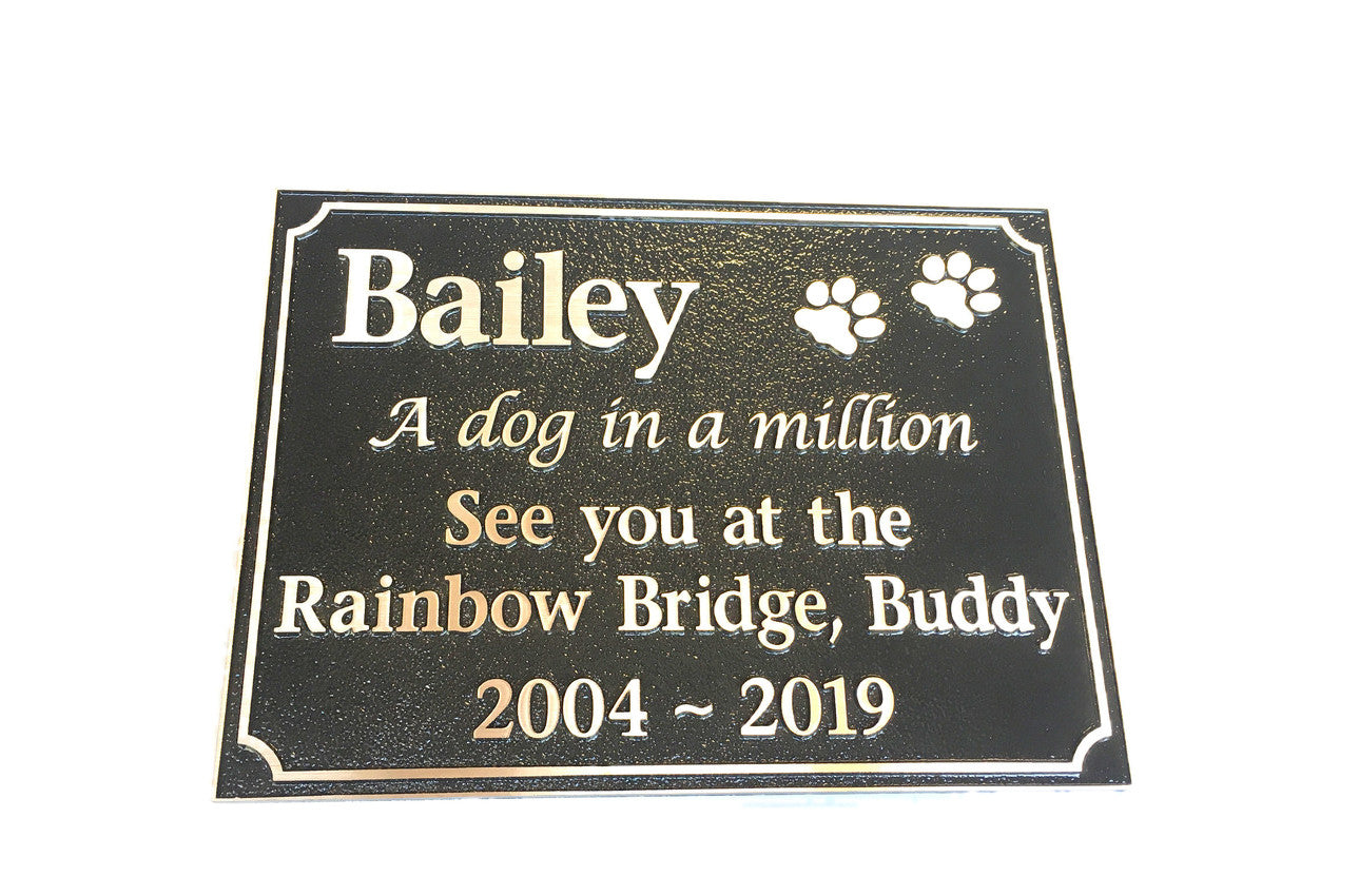 rectangle bronze plaque with memorial inscription for a pet dog.