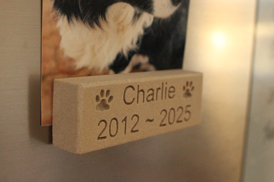 Sandstone Pet Memorial Engraved Fridge magnet, with the name "Charlie" and "2012-2025" enscribed on it
