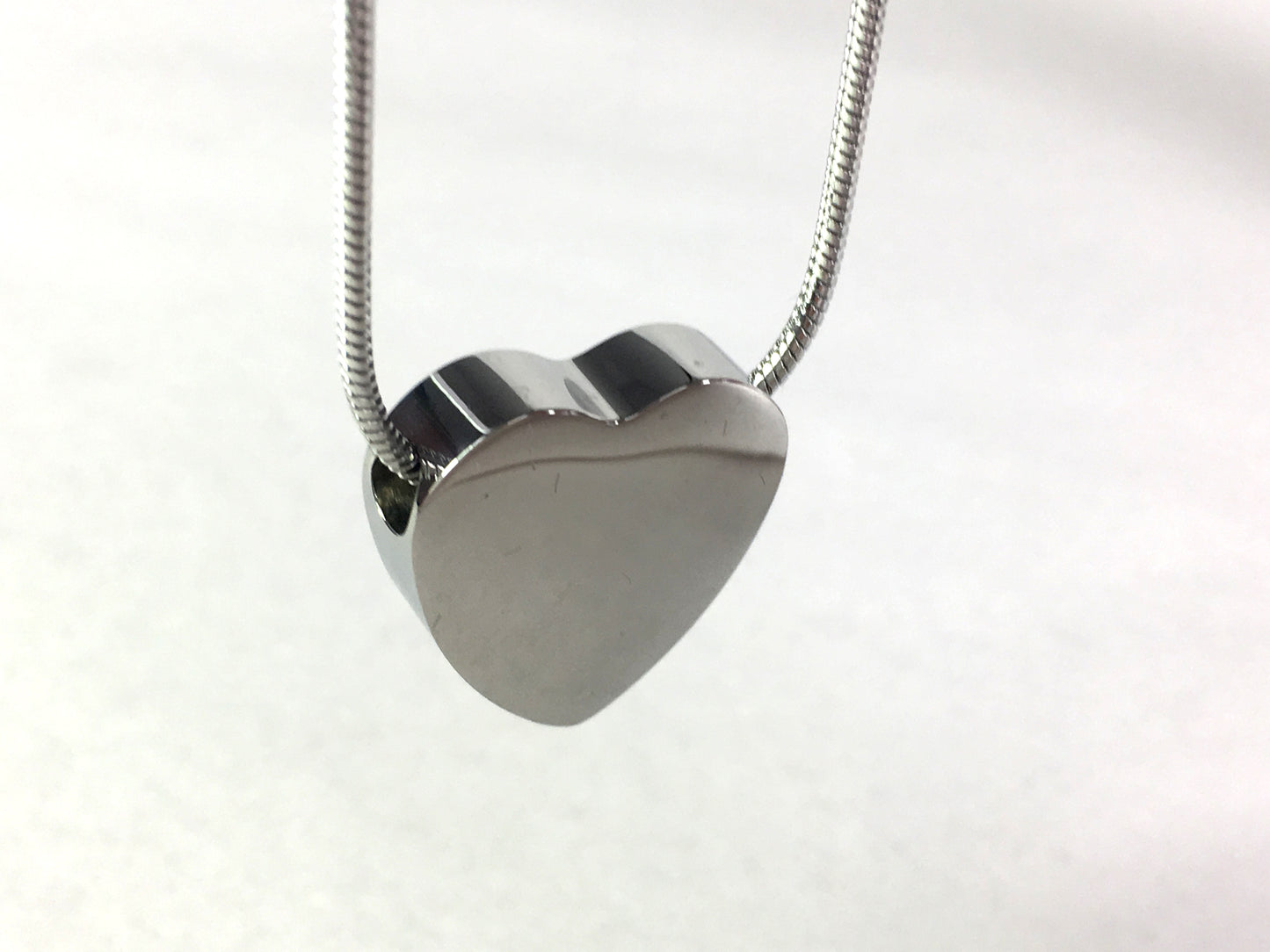 Cremation Jewellery Necklace with a Silver heart shaped pendant design
