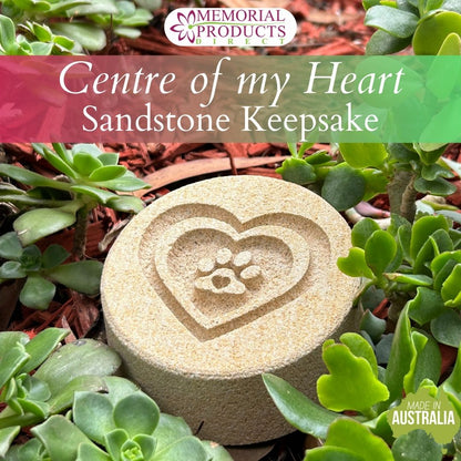 engraved sandstone keepsake with a love heart desgin that has a paw print inside